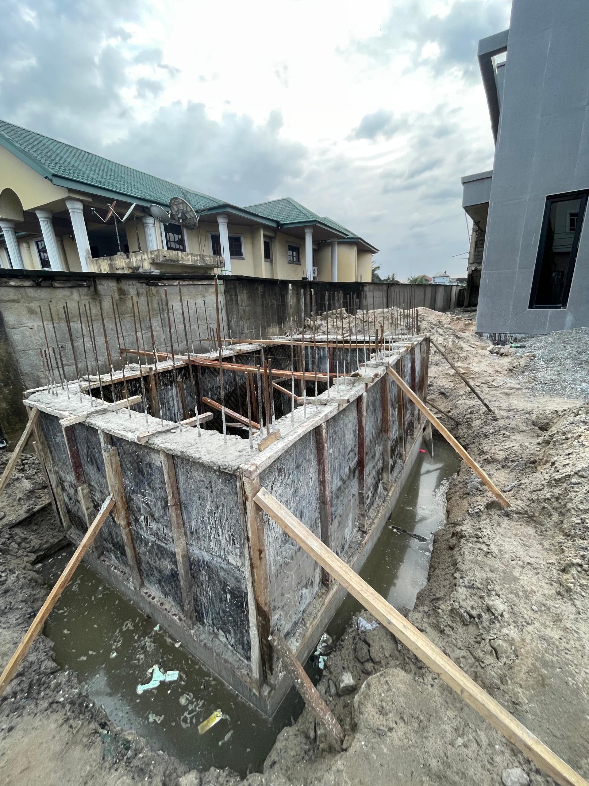 Timber formwork and reinforced concrete decking being prepared on site.